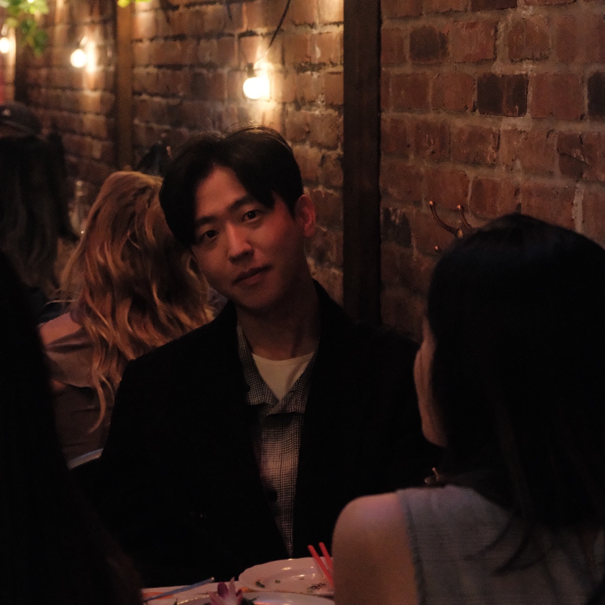 Guests turning toward the camera during supper club