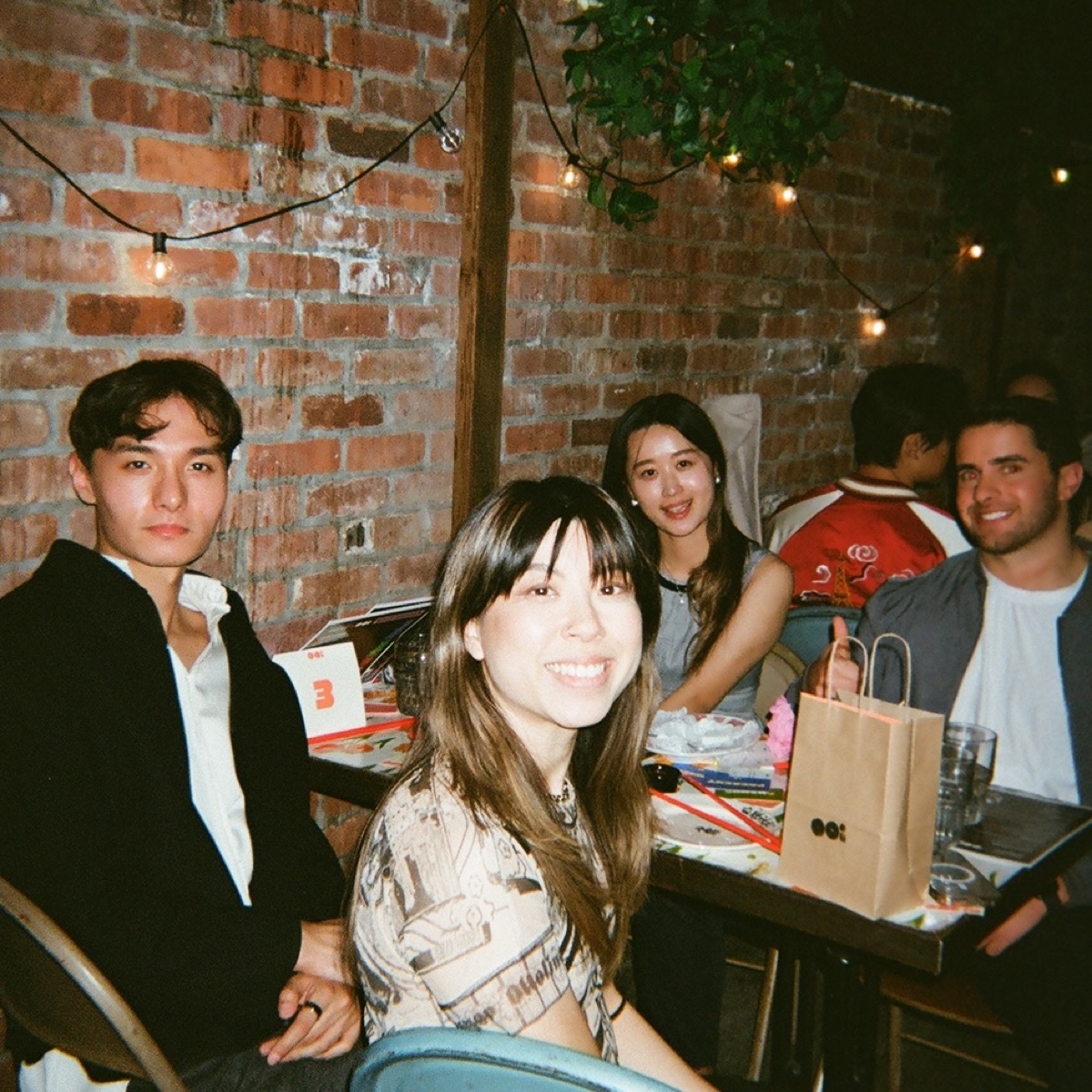 Two guests seated during a supper club dinner